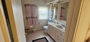 Shower, towels, soap, toilet paper