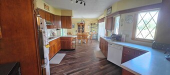 4 Bedroom Farmhouse Nestled on Quiet 65-acre property