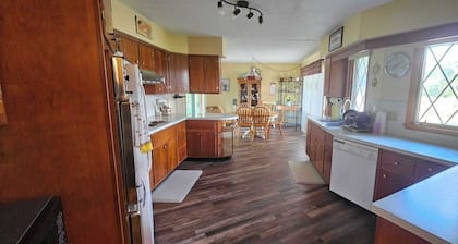 4 Bedroom Farmhouse Nestled on Quiet 65-acre property