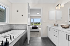 Hair dryer, towels, soap, shampoo - Stunning Executive Home » Central AC » King Bed (Airdrie)