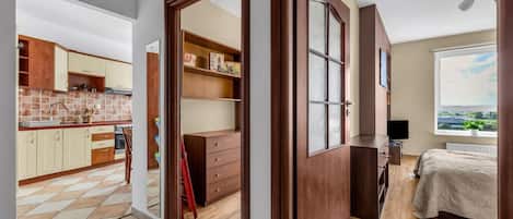 2 dormitorios, tabla de planchar con plancha, wifi gratis y ropa de cama