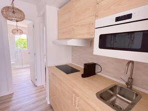 Fridge, microwave, coffee/tea maker, toaster