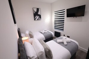 4 slaapkamers, een strijkplank/strijkijzer, wifi, beddengoed