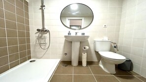 Shower, hair dryer, towels