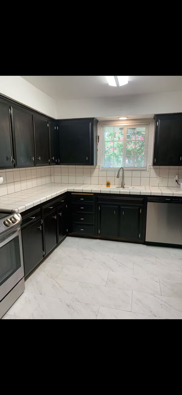 Fridge, microwave, oven, stovetop - Family friendly home a short distance from Old town Clovis! (Clovis)