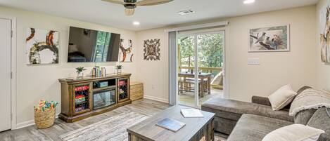 TV, fireplace, books