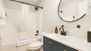Hair dryer, towels, soap, shampoo