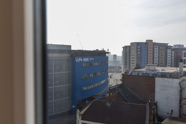 A multi-story building with a blue facade and the text "Life NHS" on it. - Waterloo in Newcastle Upon Tyne (Newcastle-upon-Tyne)