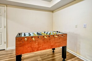 Game Room - Foosball table close-up, ready for tournament play.