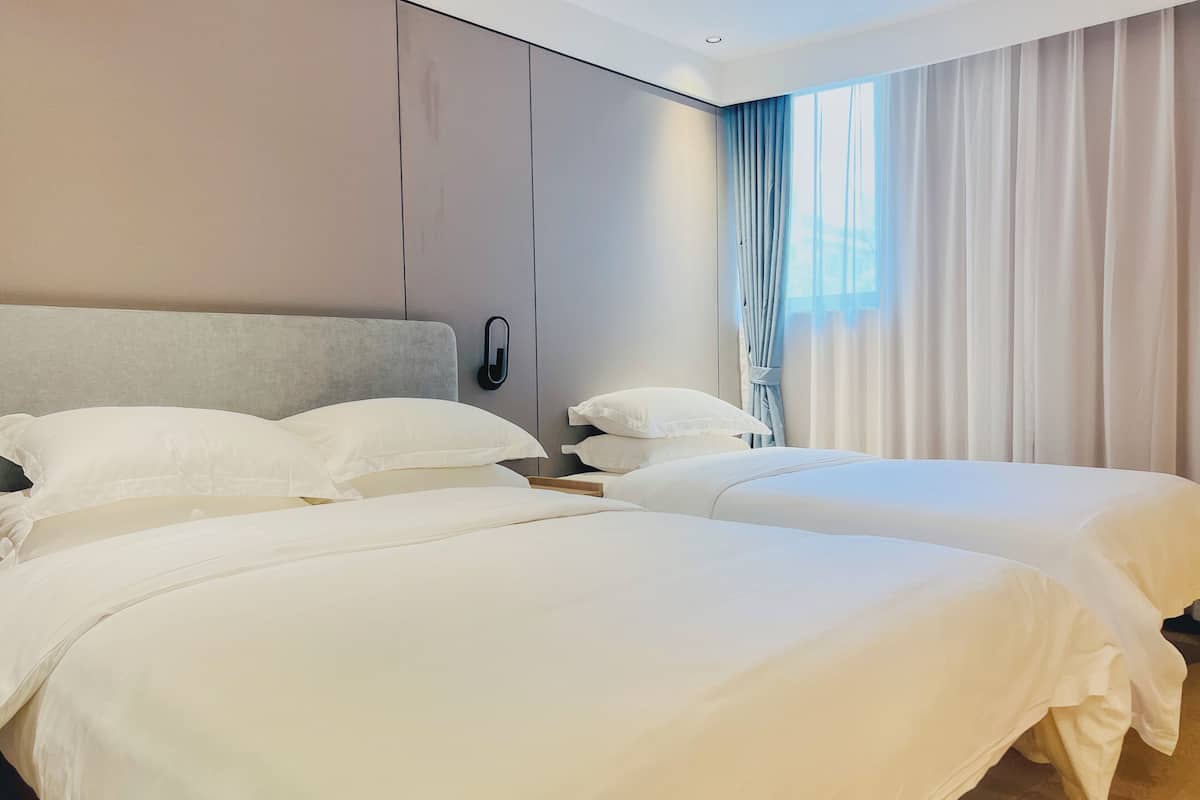 Blackout drapes, iron/ironing board, free WiFi