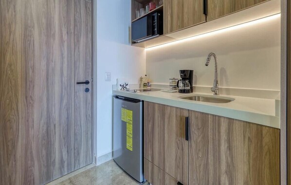 Microwave, stovetop, coffee/tea maker, toaster