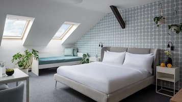 Kamar Triple Deluks | Minibar, tempat tidur bayi gratis, Wi-Fi gratis, dan seprai linen