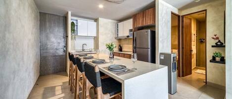 Fridge, microwave, stovetop, coffee/tea maker