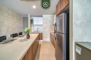Fridge, microwave, stovetop, coffee/tea maker