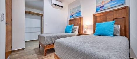 2 bedrooms, desk, iron/ironing board, travel cot