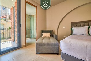 1 bedroom, desk, iron/ironing board, travel cot