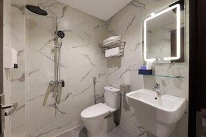 Shower, hair dryer, towels
