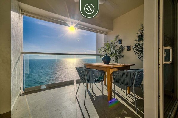 Outdoor dining - Amazing Oceanfront 1BR Condo - Rooftop Pool (Puerto Vallarta)
