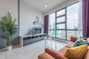 Superior Apartment, 1 Bedroom, Kitchen, City View | Living area | 35-inch TV with cable channels