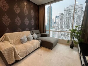 Apartemen Superior, 3 kamar tidur, dapur, pemandangan kota | Area keluarga | TV