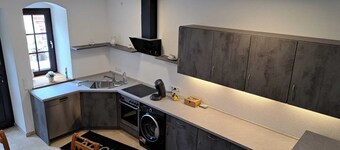 Cozy vacation apartment with garden and barbecue facilities