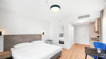 Desk, laptop workspace, blackout drapes, soundproofing