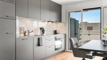 Exclusive Penthouse | Private kitchen | Fridge, microwave, oven, stovetop