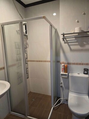 Shower, hydromassage showerhead, designer toiletries, hair dryer