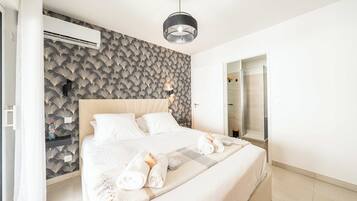 1 bedroom, desk, iron/ironing board, travel cot