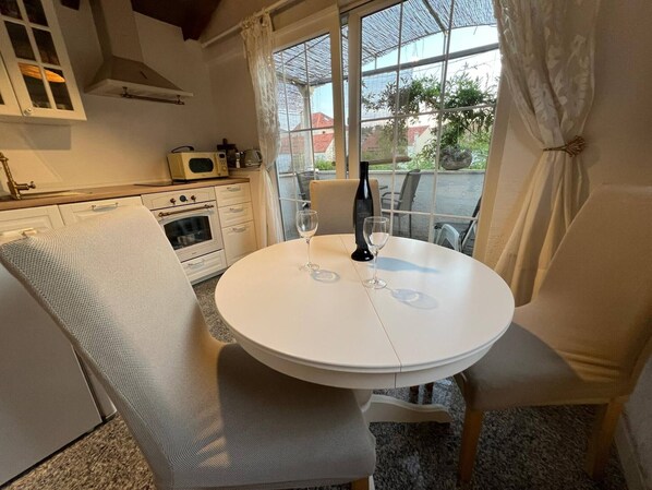 Fridge, coffee/tea maker, cookware/dishes/utensils