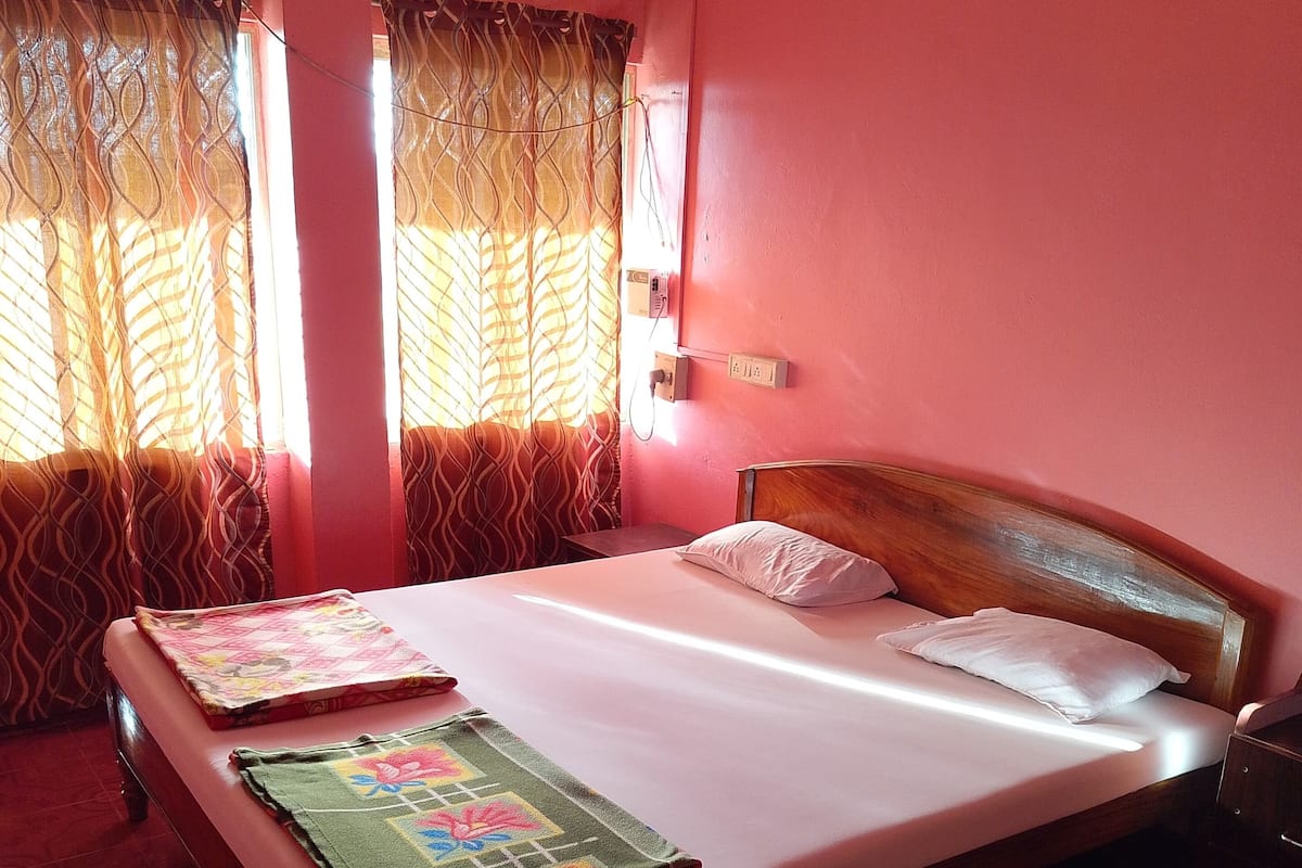 Deluxe Double Room, Patio, City View | Desk, laptop workspace, free WiFi