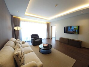 スーペリア ダブルルーム 1 ベッドルーム プールビュー | リビング エリア