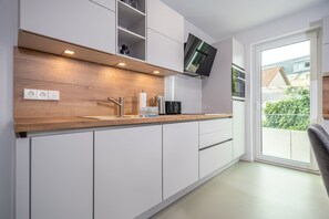 Réfrigérateur, four, plaque de cuisson, lave-vaisselle