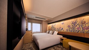 A hotel room with a bed, a TV, a small table, and a decorative wall. - ANCHORED by RIHGA OSAKA NAMBA (Osaka)