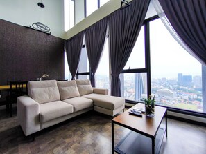 Appartement, 3 chambres | Coin séjour