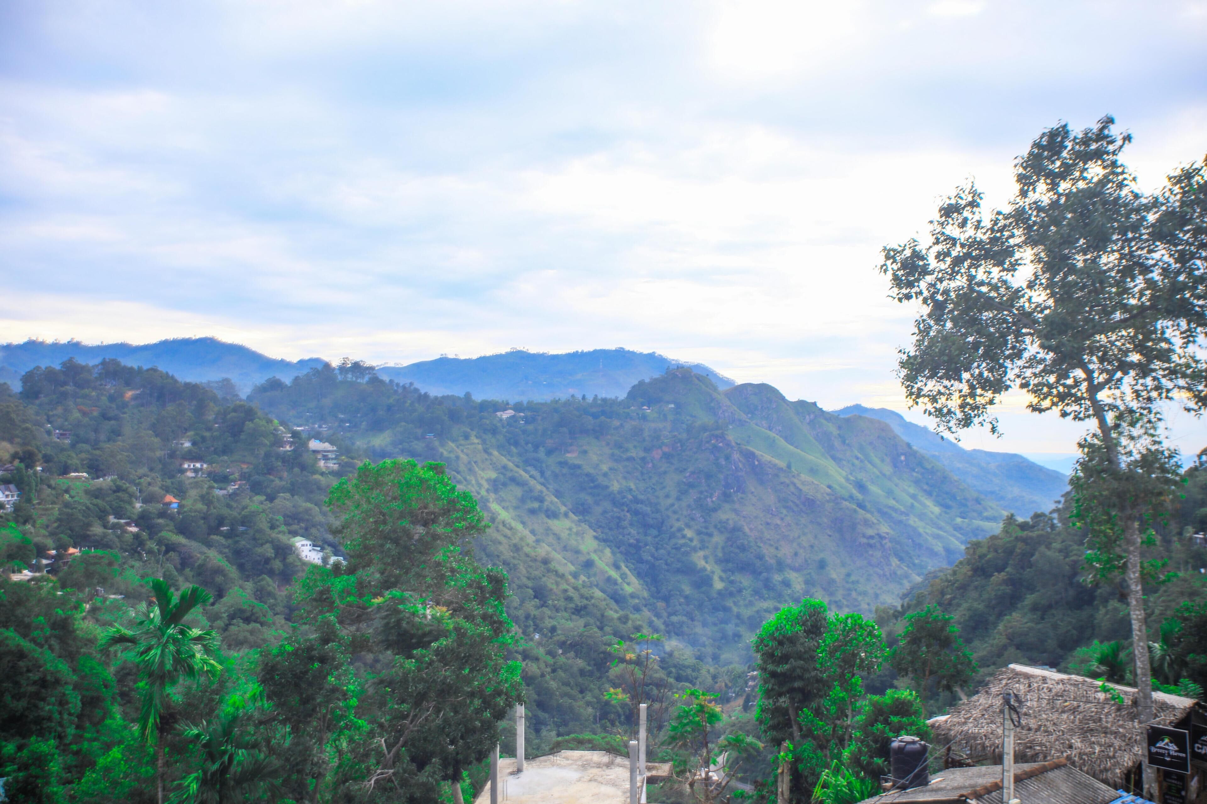 A mountainous landscape with a view of the valley below.