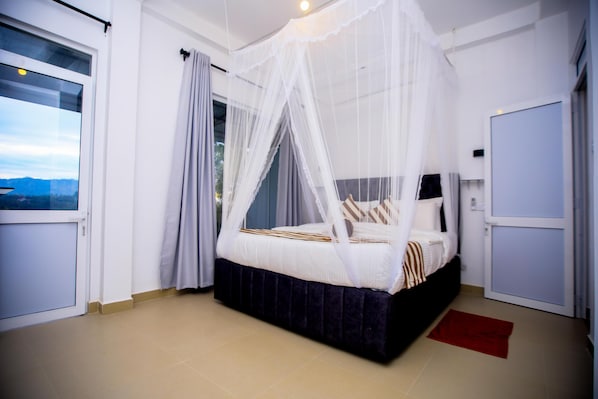 Deluxe Double Room, Mountain View | In-room safe, soundproofing, iron/ironing board, free WiFi