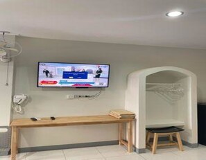Quarto casal | Área de estar | TV