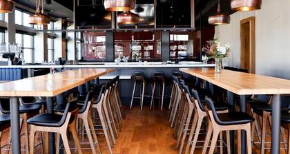 Above The Roots | Stylish 1BD on the Square