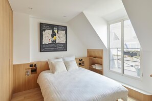 2 chambres, fer et planche à repasser, Wi-Fi, draps fournis