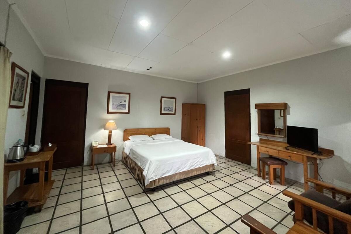 Quarto casal standard, vista para o jardim | Escrivaninha, espaço de trabalho para notebook, Wi-Fi de cortesia