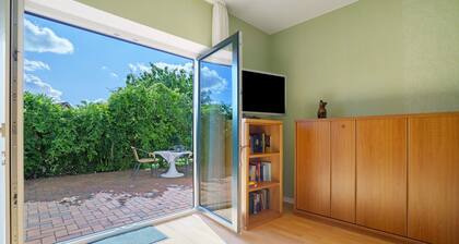 Ferienhaus 'Grün' mit gemeinsamer Terrasse und WLAN