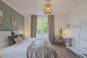 2 habitaciones, tabla de planchar con plancha, wifi y ropa de cama 