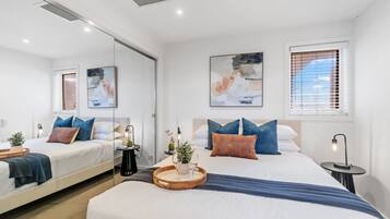 2 bedrooms, desk, iron/ironing board, travel crib