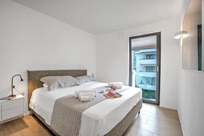 Appartement Familial, plusieurs chambres, 2 salles de bains (Sole E Lago) | 2 chambres, fer et planche à repasser, Wi-Fi gratuit, draps fournis