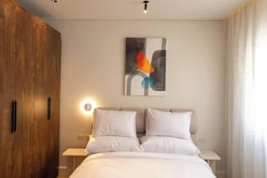 Apartamento, balcón, vistas al jardín | Tabla de planchar con plancha y wifi gratis