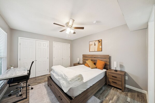 1 bedroom, desk, iron/ironing board, travel crib