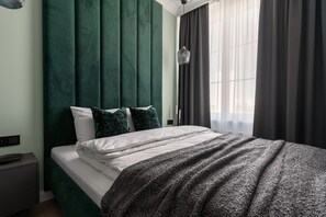 Studio suite, uitzicht op de stad | Individueel gedecoreerd, een strijkplank/strijkijzer, gratis wifi