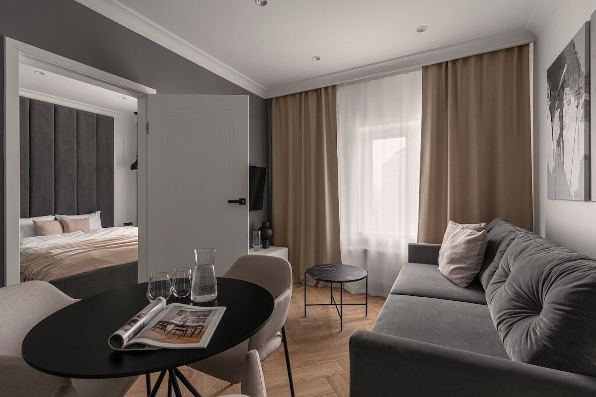 Suite, City View | Iron/ironing board, free WiFi, individually decorated, bed sheets