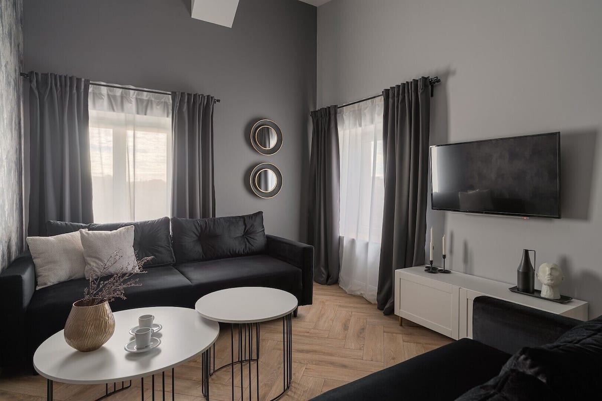 Suite, City View | Iron/ironing board, free WiFi, individually decorated, bed sheets